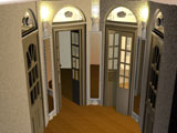 Застекленные двери,выходящие в холл,который кажется больше, отражаясь в узких зеркалах,подсвеченных светильниками